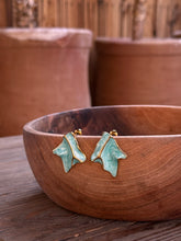 Boucle d’oreille sua