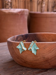 Boucle d’oreille sua