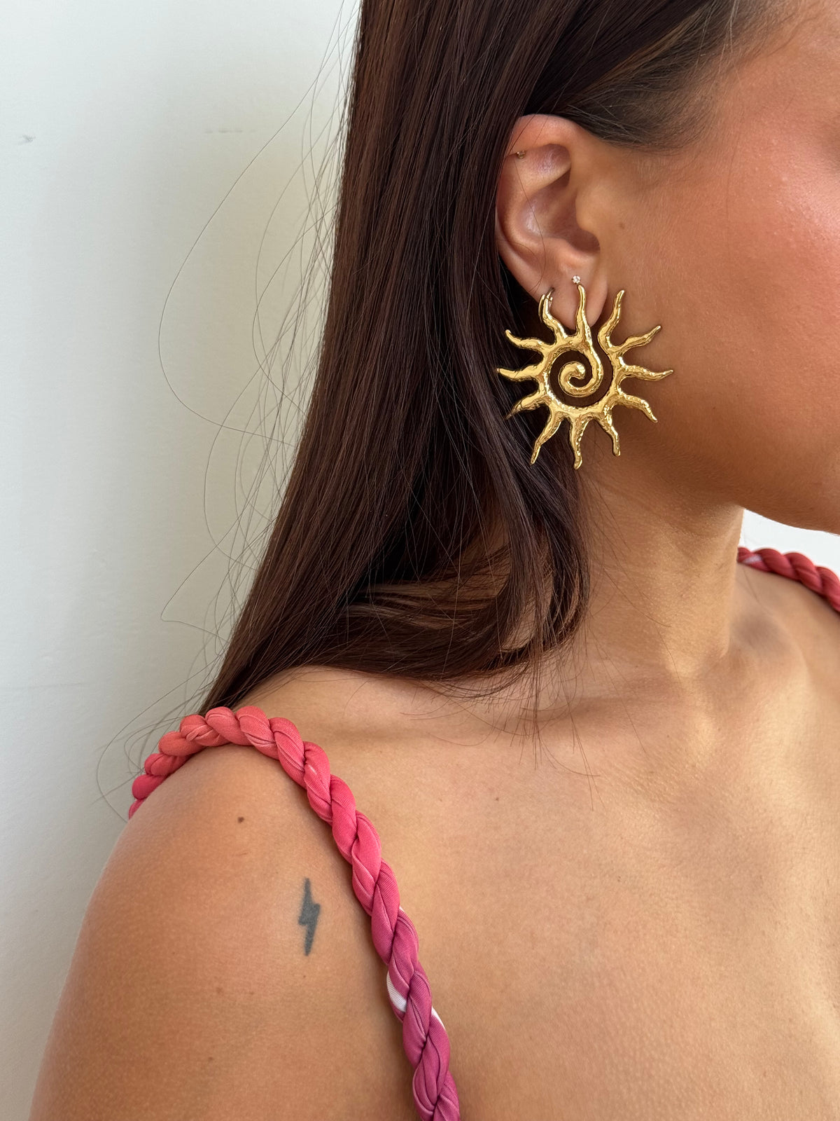 Boucle d’oreille sol